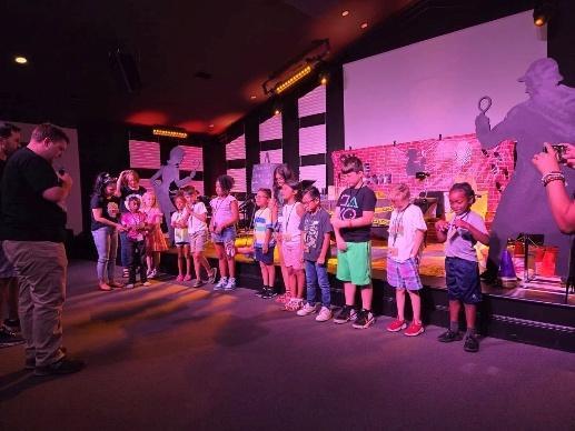 Children's church lineup at Grace Life Church during a vibrant Sunday service.